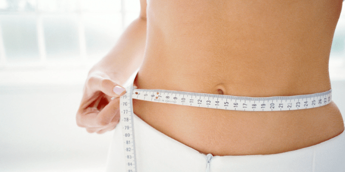 измерване на талията по време на диета с диня